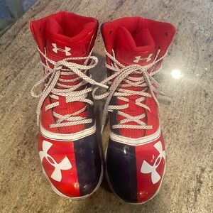 High top Red, white and blue UA cleats. Size 4.5